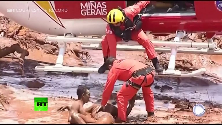 Video: Dramatic: Dam collapse survivors pulled from mud into chopper hovering inches from ground