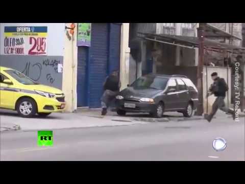 Video: Shootout in broad daylight between Brazilian police and drug traffickers, at least 13 killed