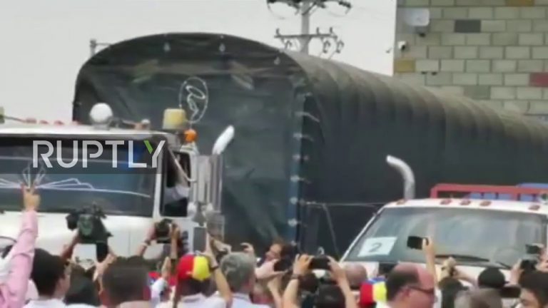 Video: Guaido mounts humanitarian aid truck headed to Venezuela