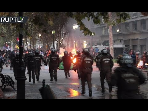 Video: Tear gas & water cannons: Protests against Bolsonaro visit to Chile end in chaos